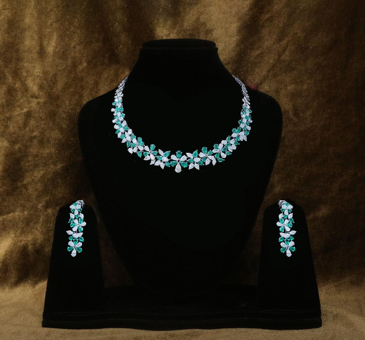 Celestine Emerald Necklace Set — 18K white gold necklace set by Nyce Designz